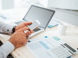 Microsoft Dynamics - Businessman using a financial app